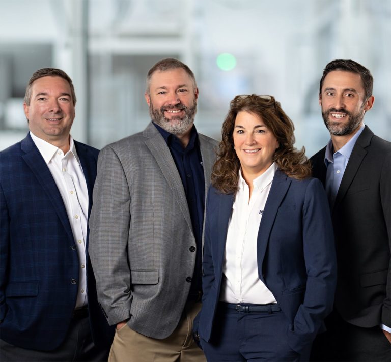 Photo of the Isometric Micro Molding Leadership team, left to right, Brent Hahn, Wayne Shakal, Donna Bibber, and John Gleason
